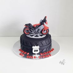 a birthday cake with a motorcycle on top