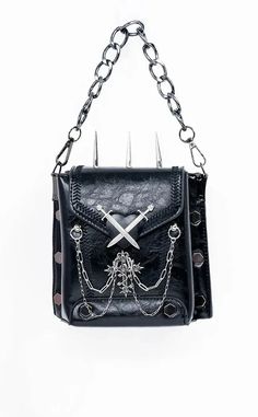 Your new statement bag for 2025 is here - the Reliquary Spiked Handbag.