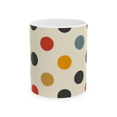 a polka dot coffee mug on a white background