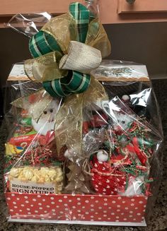 a christmas gift box with candy and candies