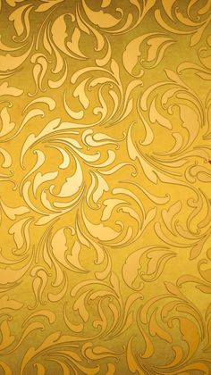 an abstract gold background with swirls and leaves