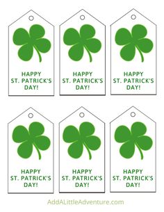 st patrick's day tags with four leaf clovers