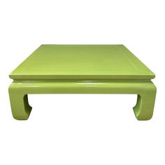 a bright green coffee table on white background