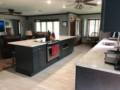 the kitchen is clean and ready to be used as a living room or dining area