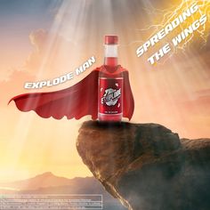 a bottle of red wine on top of a cliff with the caption's explode man spreading the wings