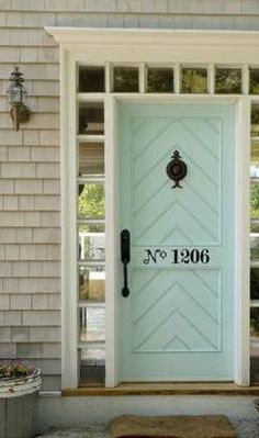 a blue front door with the number 19001 on it