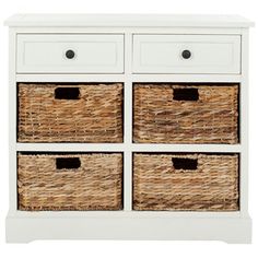 white dresser with wicker baskets on the drawers