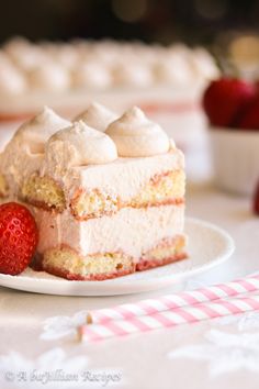 a piece of cake on a plate with strawberries