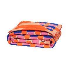 an orange and blue blanket folded on top of each other