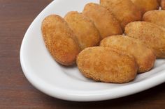 some fried food is on a white plate