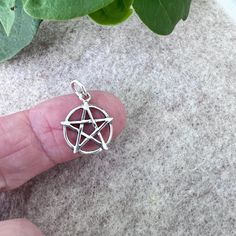 Sterling silver small pentacle necklace pendant 925 sterling silver pentagram pendant. Star sits on top of circle with points stretching just outside the circle. It measures 5/8" across, 3/4" with bail. You get just the pendant. Add a chain? Get a complimentary stainless steel chain with the pendant. Write the length you prefer in notes. If you would like to purchase a 1mm sterling silver curb chain, click on the drop down menu to add to the cart. If you would like a 1.5mm sterling bead ball cha Pentacle Necklace, Jewelry Goth, Pentagram Pendant, Bead Ball, Wiccan Jewelry, Ball Chain, Organza Bags, Stainless Steel Chain, Necklace Pendant