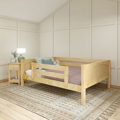 a wooden bed sitting on top of a rug in a bedroom next to a table