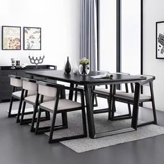 a dining room table with chairs and vases on top of it in front of a window