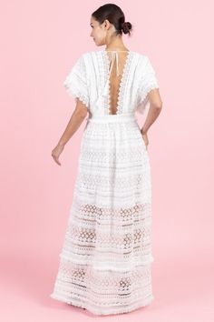 "Deep V-Neck Maxi Lace Dress with Accentuated Waist Color: White Material: 100% Poly Length: 50\" armpit down Waist: Small 28\", Medium 30\", Large 32\" Model wearing S and is 5'7\" tall ALL SALES ARE FINAL." Delicate Lace V-neck Dress For Brunch, Summer V-neck Maxi Dress With Scalloped Lace, White Maxi Dress With Scalloped Lace V-neck, Bohemian V-neck Dress With Crochet Trim, Bohemian V-neck Dress With Scalloped Lace, Bohemian V-neck Crochet Lace Dress, White V-neck Maxi Dress With Lace Trim, Bohemian Scalloped Lace Dress For Garden Party, White V-neck Lace Dress With Lace Trim