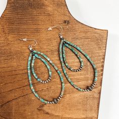 These gorgeous earrings are genuine Native American artwork. They include a long turquoise beaded teardrop with sterling silver Navajo pearls.Earrings measure approximately 3.5 inches long. SKU: #1103-2229 Bohemian Beaded Turquoise Teardrop Earrings, Southwestern Turquoise Teardrop Beaded Earrings, Southwestern Teardrop Turquoise Beaded Earrings, Southwestern Teardrop Beaded Earrings, Turquoise Teardrop Beaded Bohemian Earrings, Southwestern Teardrop Jewelry With Colorful Beads, Bohemian Turquoise Beaded Teardrop Earrings, Turquoise Bohemian Beaded Teardrop Earrings, Bohemian Turquoise Teardrop Beaded Earrings