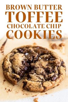 a chocolate chip cookie with the words brown butter toffee chocolate chip cookies on it