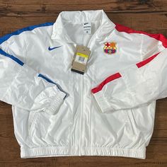 Nike Fc Barcelona 23/24 Essential Gx Jacket ‘White’ (Size Us Wmns S). Condition Is New With Tags. Come As Seen In Pictures. Any Questions Send A Message. All Items Are Shipped Within 24hrs Of Purchase Sporty White Windbreaker For Sports Season, White Sports Windbreaker, Nike White Windbreaker For Winter, Nike White Winter Windbreaker, White Track Jacket For Sports Season, White Track Jacket For Outdoor Sports Season, Nike White Outdoor Outerwear, White Sportswear Windbreaker For Outdoor, White Sportswear Outerwear For Outdoor