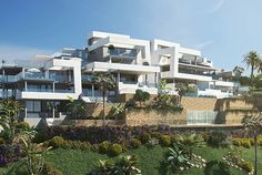 an artist's rendering of a building with balconies and palm trees in the foreground