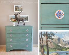 the dresser is painted green and has pictures on it, along with an antler's head