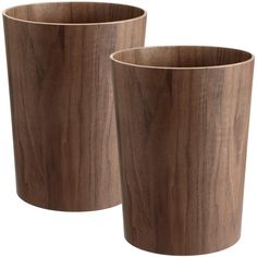 two wooden cups sitting next to each other