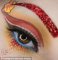 Creative: His Pokemon inspired looks include a stunning fiery red look inspired by Charmander Charmander Makeup, Pokemon Makeup Looks, Charmander Cosplay, Charmander Costume, Pokemon Makeup, Pokemon Ideas, Pokemon Costumes, Beauty Video Ideas, Fun Makeup