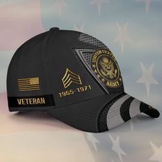 a black hat with an american flag and the words veteran written in gold on it