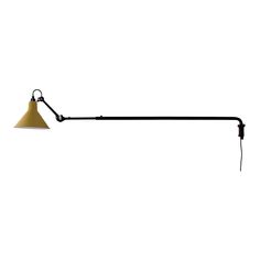 a black and gold lamp on a white background