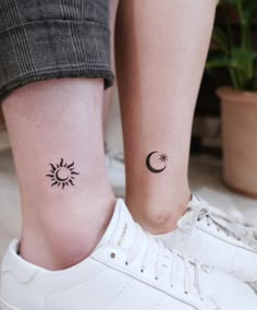 two tattoos on the legs of people with sun and moon tattoo designs on their feet