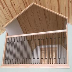 the inside of a house with wood and metal railings