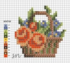 a cross stitch pattern with an orange and blue flower in the shape of a basket