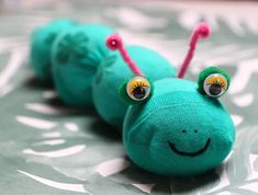 a close up of a stuffed animal on a bed