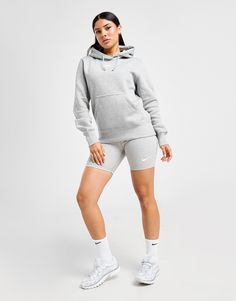 Layer up in classic Swoosh with this women's Phoenix Fleece Hoodie from Nike. In a Dark Grey Heather colourway, this regular-fit pullover is made from signature brushed fleece fabric for plush comfort. It features elongated ribbed trims, a drawcord-adjustable hood and a kangaroo pocket for your essentials. Finished off with the iconic Nike logo embroidered to the chest. Machine washable. | Our model is 5'8.5" and wears a size small. Nike Phoenix Fleece, Nike React Vision, 270 Nike, Chest Machine, Football Training, Grey Nikes, Football Boots, Jd Sports, Outdoor Style