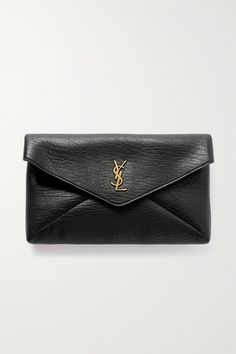 SAINT LAURENT's 'Cassandre Large Envelope' clutch is an instant classic you'll keep coming back to. It's made from leather with a distinct grain, so it almost resembles a vintage style. The brushed gold-tone 'YSL' monogram only adds to enduring appeal. Ysl Bag Clutch, Black Designer Clutch, Ysl Small Envelope, Ysl Black Envelope Bag, Ysl Black Clutch, Black Ysl Wallet, Large Envelope, Designer Clutch, Black Clutch