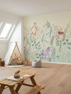 a child's room with a teepee tent, wooden bench and wallpaper