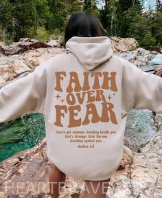 Faith Over Fear Christian (On Back) Sweatshirt, Shirts For Christian, Religious Shirts, Faith Based Hoodie, Trendy Jesus Lover Church  ♥️ PRODUCT DETAILS: ★ GILDAN® 18000 Unisex Heavy Blend™ Crewneck Sweatshirt This well-loved sweatshirt is the perfect addition to any collection! The air-jet spun yarn and quarter-turned fabric helps eliminate creases and pilling, while the mix of cotton and polyester creates a soft and comfortable feel. * 50% Cotton 50% Polyester * Fabric weight: 8.0 oz/yd² (271 Sister Outfits, Trendy Hoodies, Aesthetic Hoodie, Fourth Of July Shirts, Cute Graphic Tees, Christian Sweatshirt, Long Sleeve Tops Casual, Faith Over Fear, Christian Clothing