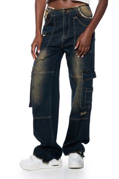 C’est la vie, ma chérie! The AKIRA Label Paris Lived Relaxed Fit Jeans are made from a soft and stretchy acid wash denim base fabrication and feature a high rise elastic waistband, a wide leg silhouette with a relaxed fit, distressed detailing on the hems, a classic five-pocket design, six additional cargo pockets, and a few distressed cutouts dispersed throughout. Complete with utility seaming details and a front zipper button closure. Style with an oversized tee with chunky sneakers for a laid back ensemble.  - Self: 90% Cotton 8% Polyester 2% Spandex - Hand Wash Cold - Super Stretchy - Imported  (all measurements are approximate from size small) - 33” Inseam - 11.75” Rise - Model is 5'9"  Product ID: 366367 Acid Wash Denim, Chunky Sneakers, Relaxed Fit Jeans, Oversized Tee, Acid Wash, Pocket Design, Fit Jeans, Jeans Fit, Front Zipper