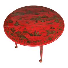 Antique 19th Century Georgian Chinoiserie scarlet red lacquer drop leaf dining or side table.  Wonderful raised decoration in gold leaf depicting Chinese figures in a landscape with pagodas and Chippendale fences.  Slight oval round shape.  The top measures 45 1/2" x 44 1/2" with the leaves up and stands 27 1/2" tall.  With the leaves down the top measures 14 1/2" deep.  God condition - wear consistent with age.  Displays well and fully functional. Chinese Dining Table, Leaf Dining Table, Drop Leaf Dining Table, Red Lacquer, Chinoiserie, Gold Leaf, Round Shape, Scarlet, 19th Century