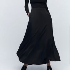 Zara Long Skirt Limited Edition Color-Black Size-Xl. Nwt Zara Relaxed Flared Maxi Skirt, Zara Flared Maxi Skirt, Black Full-length Skirt For Fall, Chic Black Maxi Skirt For Winter, Chic Black Stretch Maxi Skirt, Winter Black Wide Leg Skirt, Full Length Black Skirt For Fall, Zara Flared Lined Maxi Skirt, Zara Flared Maxi Skirt With Lining