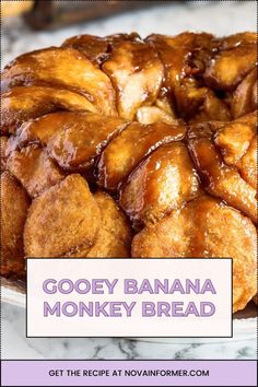 Indulge in this irresistible banana monkey bread! Soft, pull-apart bites loaded with banana flavor and coated in a sweet, gooey glaze. Perfect for brunch, dessert, or anytime you crave something Delicious. 👆 CLICK THE LINK for this monkey bread recipe and 📌 SAVE THE PIN for future baking needs! | Gooey Banana Monkey Bread - A Crowd-Pleasing Treat Banana Monkey Bread, Berry Yogurt Parfait, French Toast Recipe Cinnamon, Avocado Dip Recipe, Banana Monkey, Yogurt Parfait Recipe, Brunch Dessert, Monkey Bread Recipe, Frozen Bread Dough