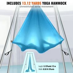 a blue hammock hanging from a metal frame with instructions on how to use it