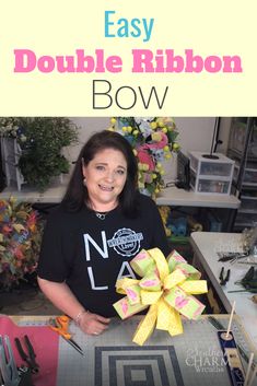 a woman sitting at a table with a bow in front of her and the words easy double ribbon bow on it