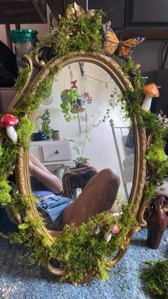 a person sitting in front of a mirror with moss growing on it and the caption says, hey so im not totally new to pinterest out a white back and now