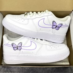 authentic white Nike Air Force 1 custom sneakers hand painted lilac purple lines on the swooshes with 1 butterfly on the outsides of the sneakers on the insides of the sneakers lilac purple lines on the swooshes All sneakers are made on order, please allow the indicated time for your item to be shipped. If you have any questions about the process time or do you need the sneakers quickly? Just send us a message!   * Be aware of your sneaker size, please in doubt go to the store first * Sneakers c Hand Painted Air Force 1 Purple, Butterfly Shoes Air Forces, Custom Air Force 1 Butterfly And Flowers, Purple Nike Air Shoes, Nike Butterfly Shoes Purple, Purple Nike Air Force 1, Nike High Tops Double Swoosh Purple, Nike Shoes Women Lavender, Butterfly Air Jordans