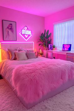 a bedroom with pink walls and lights in the corner, there is a large bed that has fluffy blankets on it