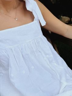 Whether you're unwinding after a long day or enjoying a lazy morning, this sleep dress will provide you with a beautiful and cozy escape from the world. 100% Cotton Runs big, so we recommend sizing down. Olivia is 5'7 wearing an XS. Lazy Morning, Cozy Loungewear, Sleep Dress, Long Day, White Eyelet, Tie Dress, Puff Sleeves, Gingham, Puff Sleeve