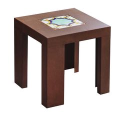 a small wooden table with a mosaic tile on it's top and bottom edge