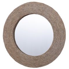 a round mirror that is made out of jute