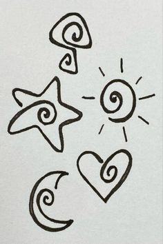 three stars and two hearts are drawn on paper