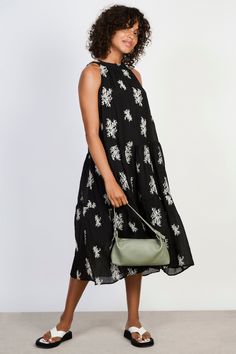 Black embroidered floral tie neck dress Spring Floral Embroidered Maxi Dress For Day Out, Spring Floral Embroidery Maxi Dress For Day Out, Chic Floral Embellished Maxi Dress For Spring, Feminine Embroidered Midi Dress For Spring, Spring Daywear Maxi Dress With Floral Embroidery, Spring Floral Print Embroidered Midi Dress, Spring Floral Print Midi Embroidered Dress, Floral Print Midi Embroidered Dress For Spring, Chic Floral Embroidery Maxi Dress For Spring