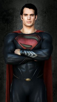 a man in a superman suit with his arms crossed